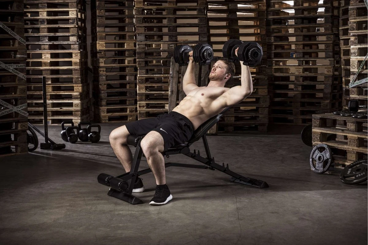 Tunturi UB80 Halterbank Verstelbaar - Fitnessbank Belastbaar Tot 200kg - Trainingsbank & Buikspierbank In één - Incl. Gratis Tunturi Training App 8 Tunturi UB80 Halterbank Verstelbaar - Fitnessbank Belastbaar Tot 200kg - Trainingsbank & Buikspierbank In één - Incl. Gratis Tunturi Training App - Afbeelding 6